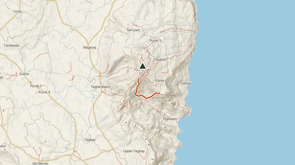 Topographic map of Mt. Puting Bato with its mapped routes in orange and the summit marked